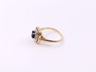 
BAGUE en or jaune et gris 750° ornée d'un...