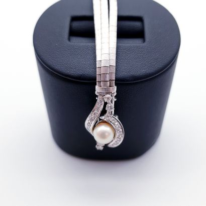 
Travail Français





BRACELET en or gris...