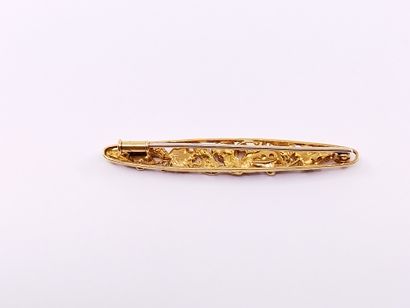 
BROCHE en or jaune 750° à décor végétal...