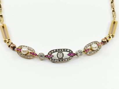
COLLIER en or jaune 750° et gris se composant...