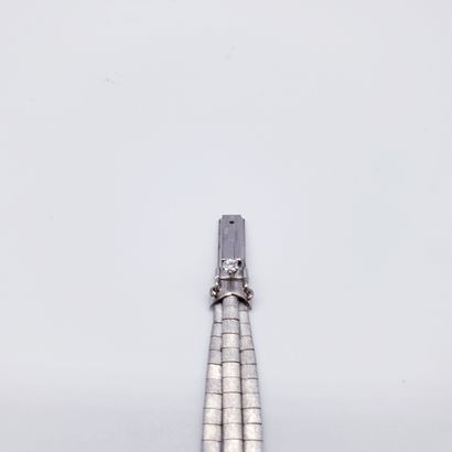 
Travail Français





BRACELET en or gris...