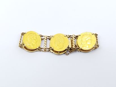 BRACELET en or jaune 750° ornée de six pièces...