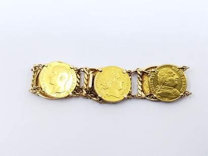 BRACELET en or jaune 750° ornée de six pièces...