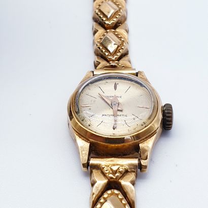 HARMONIE

Ladies' gold watch, round case,...