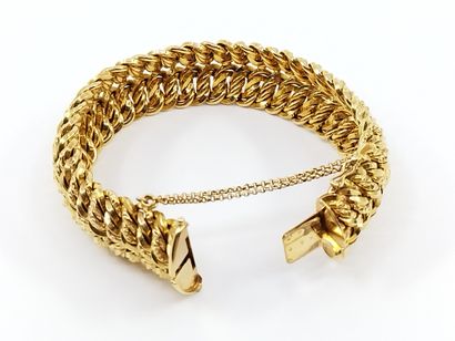 BRACELET maille amércaine en or jaune 750°

Fermoir...
