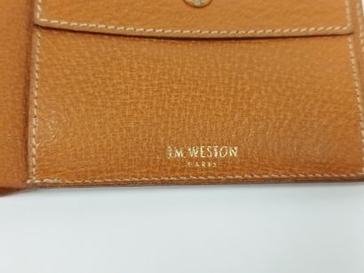 
WESTON 




Porte-monnaie en cuir marron





Petites...