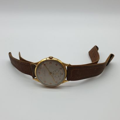 ZENITH 

wristwatch, round case in yellow...