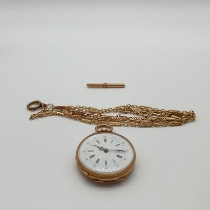 MONTRE de col en or jaune 750°, double cuvette...