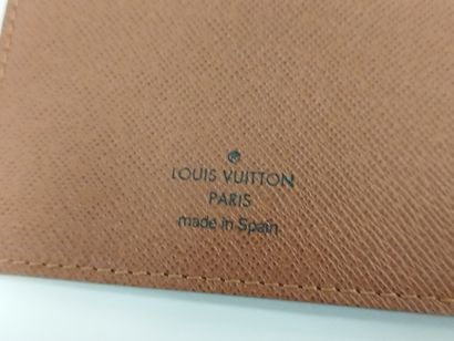 
LOUIS VUITTON 




Portefeuille en toile...