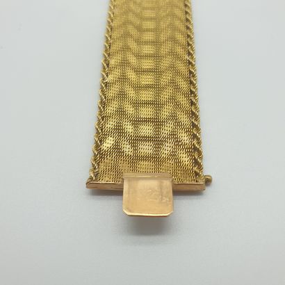 BRACELET en or jaune 750°, maille tressée...