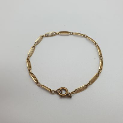 BRACELET en or jaune 750° accompagnée d'une...