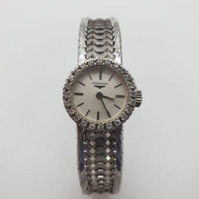 LONGINES 

Lady's wristwatch in white gold...