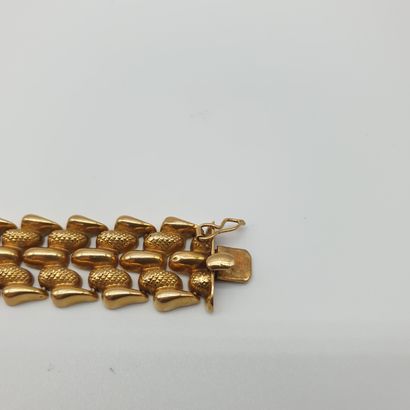 BRACELET en or jaune 750° brillant et amati,...