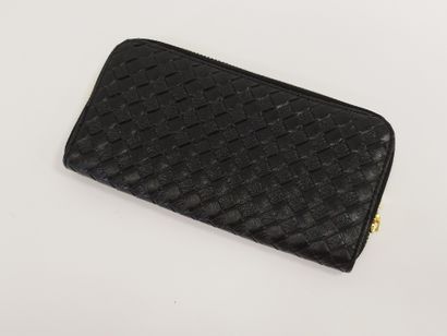LOUIS VUITTON

Etui de téléphone en cuir...