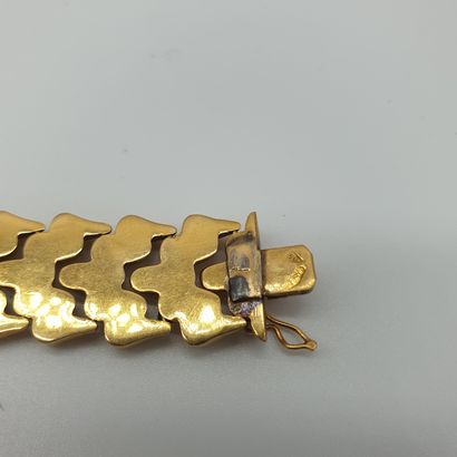 BRACELET en or jaune 750° brillant et amati,...