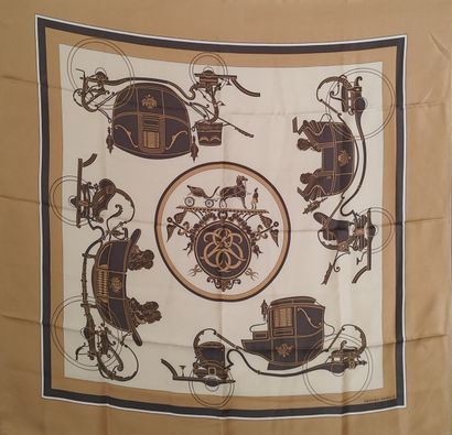 HERMES

Foulard de couleur marron et ocre,...