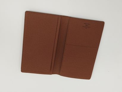 
LOUIS VUITTON 




Portefeuille en toile...
