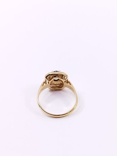 
BAGUE en or jaune et gris 750° ornée d'un...