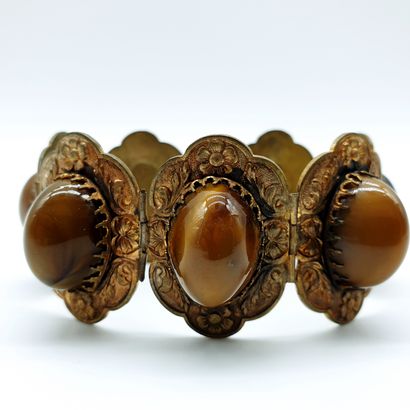 BRACELET en métal vermeillé orné de sept...