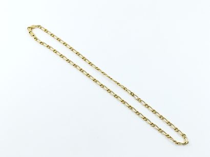 Chain in yellow gold 750° with curb chain...