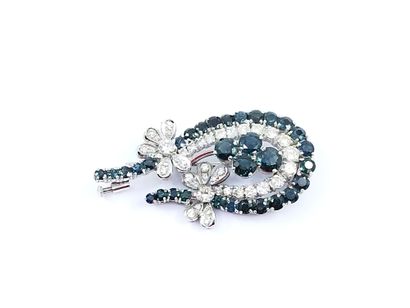 
IMPORTANTE BROCHE en or gris 750° sertie...