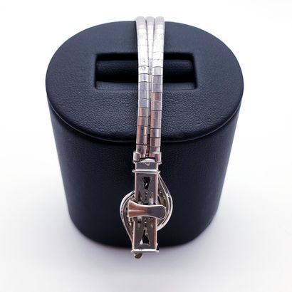 
Travail Français





BRACELET en or gris...
