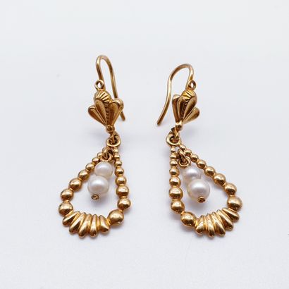 PAIR of earrings in yellow gold 750° decorated...