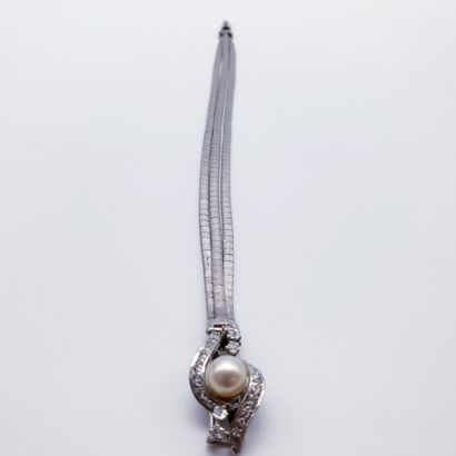 
Travail Français





BRACELET en or gris...