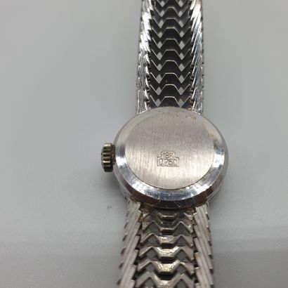 LONGINES 

Lady's wristwatch in white gold...