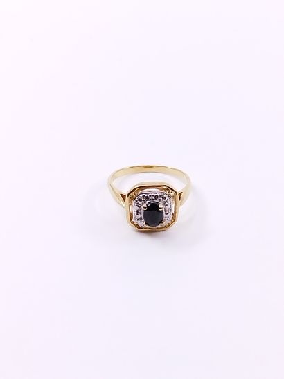 
BAGUE en or jaune et gris 750° ornée d'un...