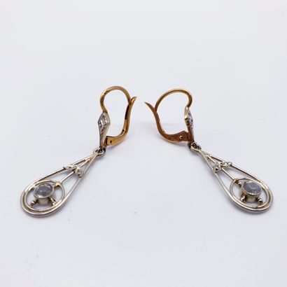 PAIR of earrings in two-tone gold with white...