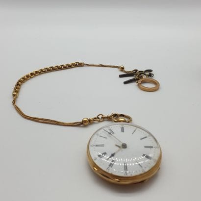 MONTRE de gousset en or jaune 750° accompagnée...