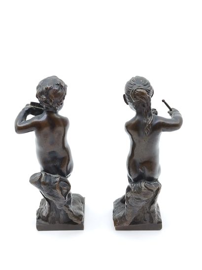 PAIR OF BRONZE with brown patina representing...