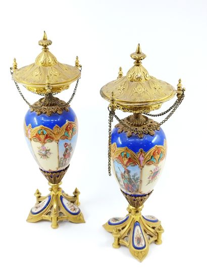 IN THE TASTE OF SEVRES

Pair of urn-shaped...