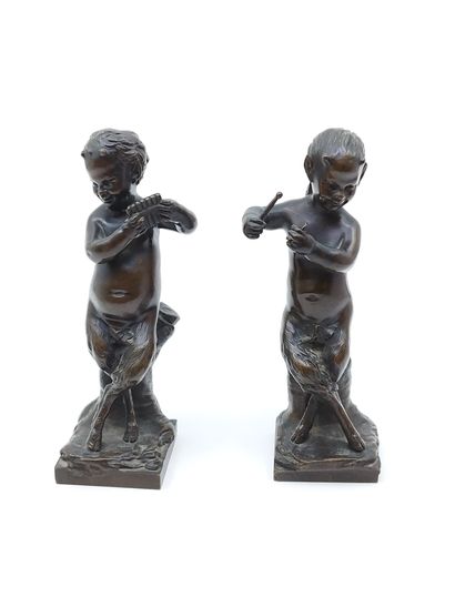 PAIR OF BRONZE with brown patina representing...