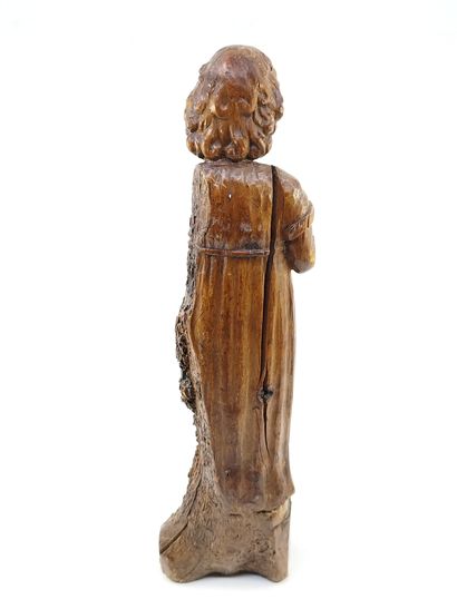 JESUS CHILD in carved wood standing on a...
