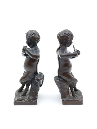 PAIR OF BRONZE with brown patina representing...