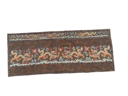 CHINA

Two decorative silk panels with gold...