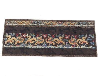CHINA

Two decorative silk panels with gold...