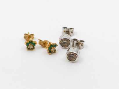 Pair of earrings in white gold 750° decorated...