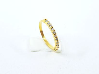 HALF-ALLIANCE in yellow gold 750° decorated...