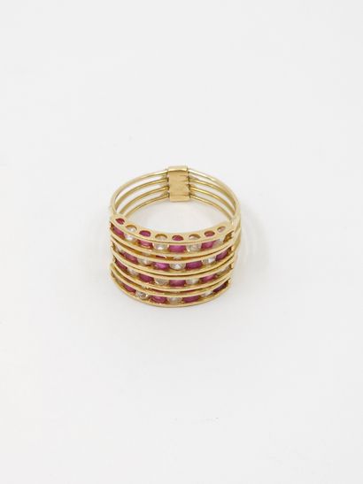Yellow gold ring 750° four rows decorated...