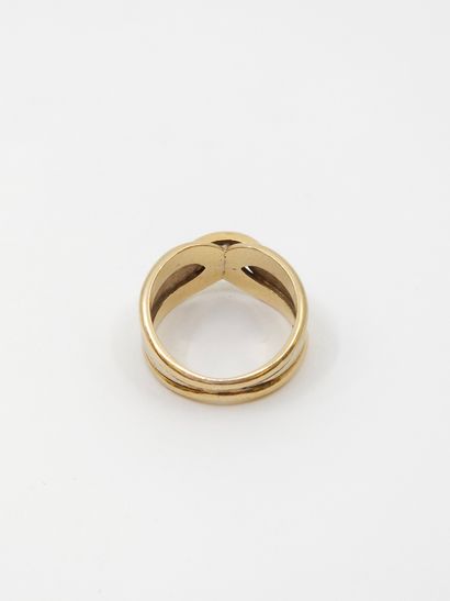 Yellow gold 750° half-barrel ring set with...
