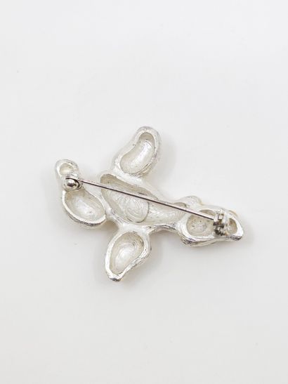 CHRISTIAN LACROIX
Broche en métal et pierres...