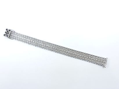 BRACELET in white gold 750°, clasp decorated...
