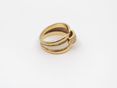 Yellow gold 750° half-barrel ring set with...
