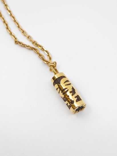 750° yellow gold CHAIN with a tiki pendant...