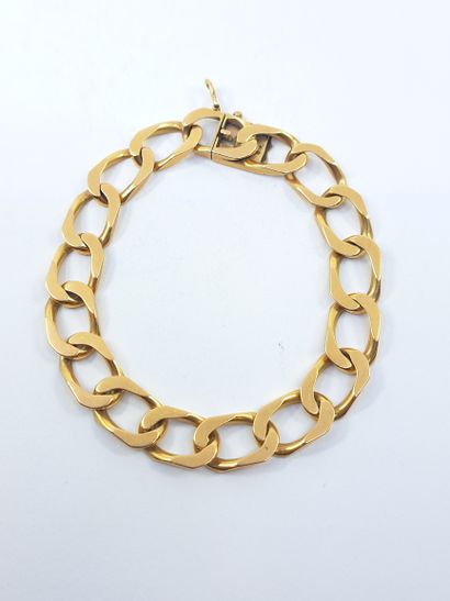BRACELET maille gourmette en or jaune 750°...