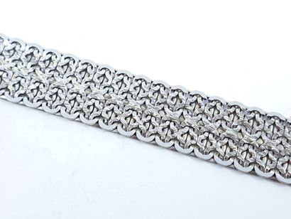 BRACELET in white gold 750°, clasp decorated...