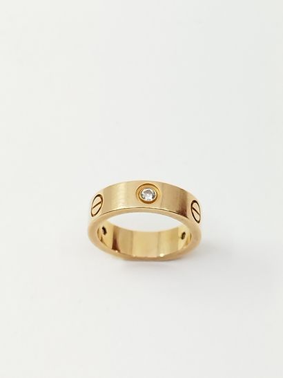 CARTIER LOVE
Bague en or rose 750° et trois...